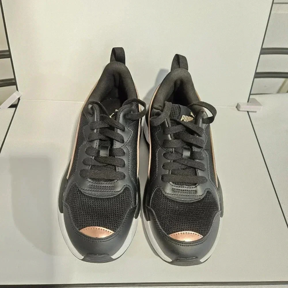 Puma Black and Rose Gold Sneakers – Stylish and Sporty